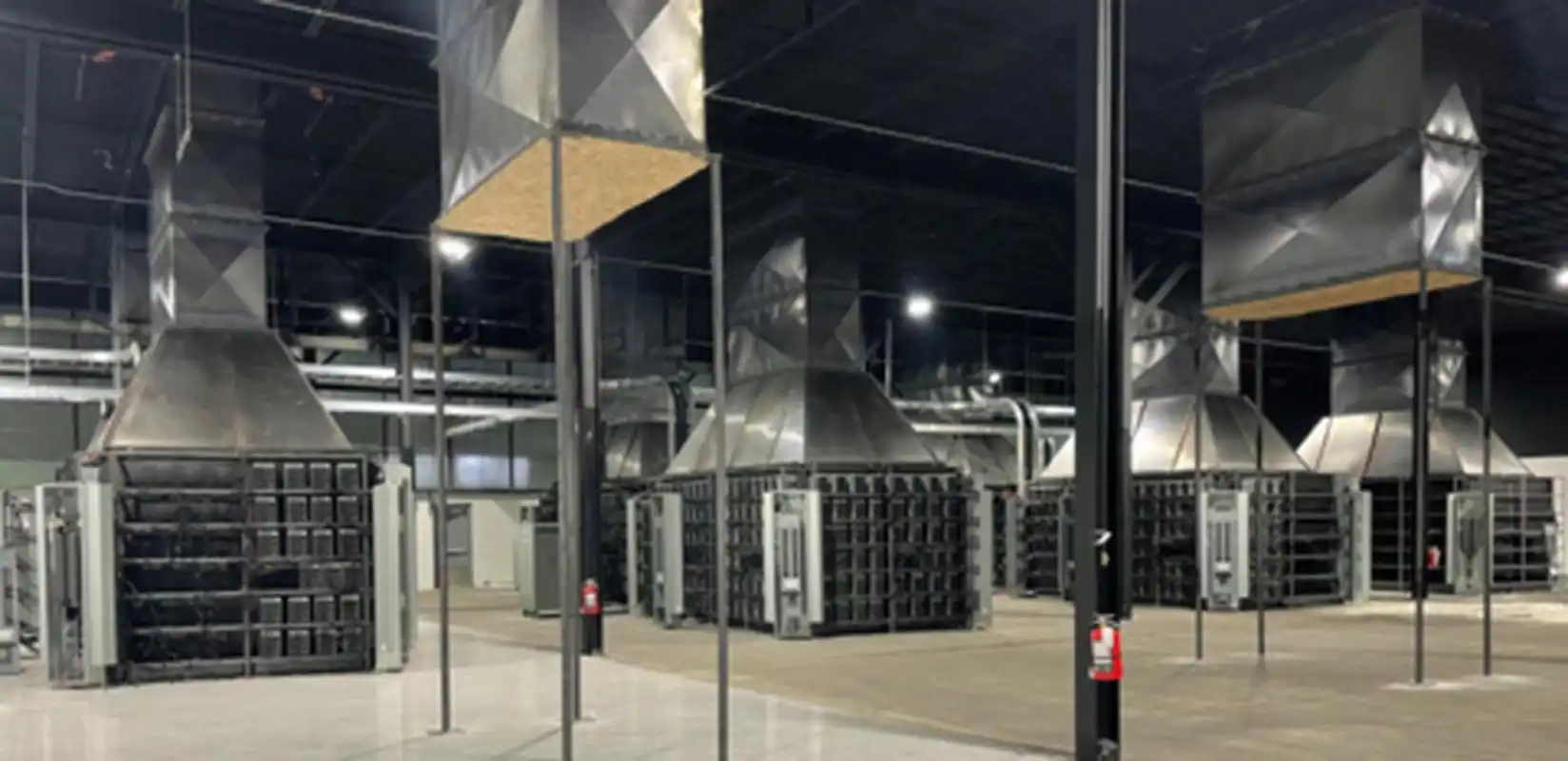 Bitcoin mining farm with rows of rigs hashing away in synchronization